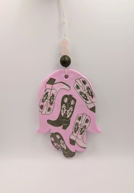 Hamsa wall art in pastel pink with olive cowboy boots