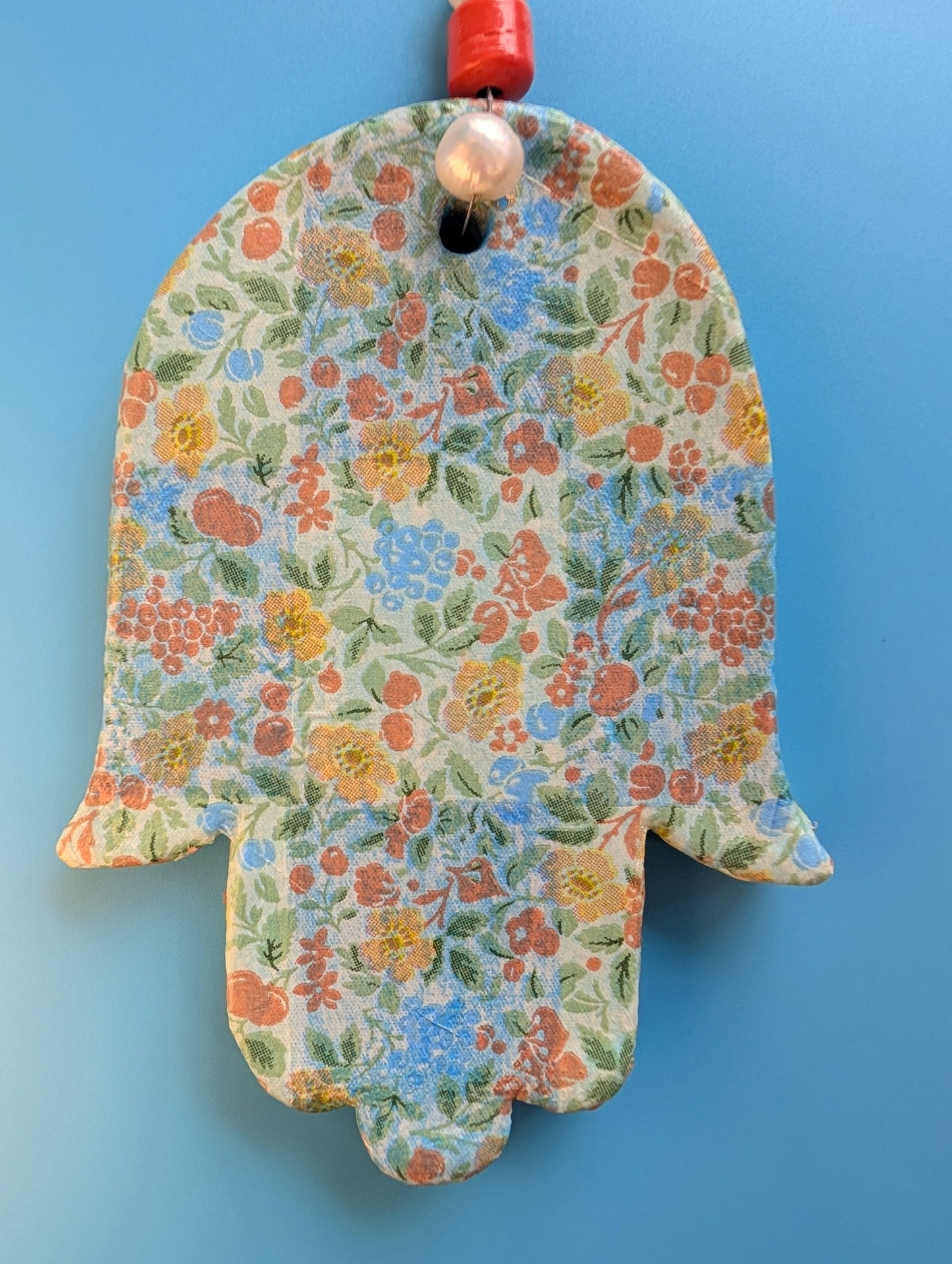 Hamsa wall art in "California floral" checkerboard with pearls